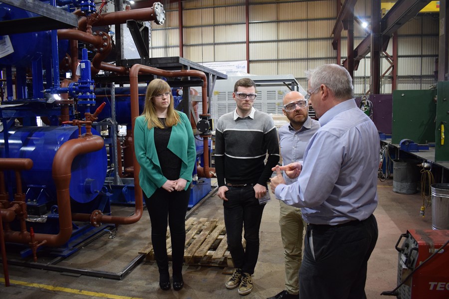 Patrick Harvie inspects water source